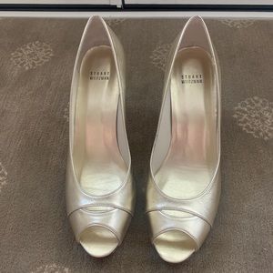 Never worn Stuart Weitzman peep toe pumps